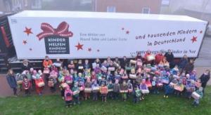 MAN Financial Services sammelte Weihnachtspäckchen für bedürftige Kinder Kinder-helfen-Kindern-2014-Telematik-Markt_web-300x164 MAN Financial Services sammelte Weihnachtspäckchen für bedürftige Kinder