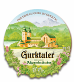 Gurktaler Eine eingeschneite Almhütte inmitten einer weißen Glitzerwelt – Gurktaler Alpenkräuter ist die Genuss- Erinnerung an den winterlichen Österreich-Urlaub
