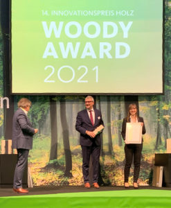 Foto-1-Woody-Award-Verleihung-247x300 MOCOPINUS zum dritten Mal mit dem Woody Award ausgezeichnet: Expertenjury prämiert schwer entflammbare Vollholzprofile PROTECO25